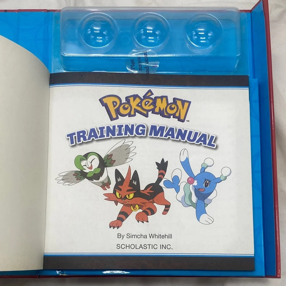 Pokemon Training Manual & Tin Set